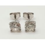 18K white gold diamond stud earrings. 2ct total diamond weight. 1.65g.