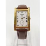 A Raymond Weil Ladies Watch. Brown leather strap. Gold plated case. 22 x 30mm. As found