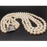 A three row of beautiful pearls necklace with a diamond clasp. Weight: 132g. Length 50-58cm. Average