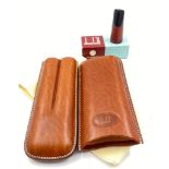 A Dunhill, high quality, tan leather, smooth, cigar case, embossed with the elegant Dunhill logo.