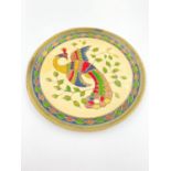 A Vintage Vividly Coloured Enamel Decorated Peacock on Metal, Wall Plate. 13cm diameter.