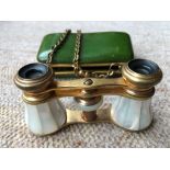 Antique pair of opera glasses finished in mother of pearl .Complete with original fitted case.