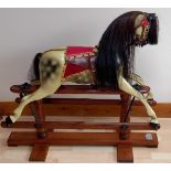 Antique Rocking Horse which can be dated back to around 1920 and purported by the below