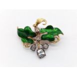 An Art Nouveau, yellow gold, floral brooch with enamel and diamonds. Weight 12.6g. Dimensions: 4.