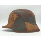 WW1 German Model 1916 Stahlhelm Helmet in jigsaw pattern camouflage. Complete with liner.