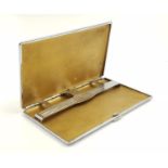 A Vintage Stylish Polo Cigarette Case. Gilt Interior with Hinged Holder. 13 x 8cm