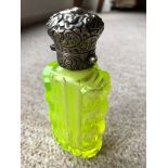 Vintage Silver topped green uranium perfume bottle.Art Nouveau period.