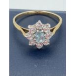 Hallmarked 9 carat gold Topaz and clear stone cluster ring. 2.1 grams. Size P 1/2 -Q.
