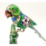 A Beautiful Silver and Enamel Parrot. Beautiful cloisonné decoration. Red-Jewelled wings. Comes with