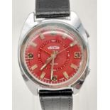 A Vintage Red Dial Swiss Made Mentor Watch. Black leather strap, good condition in working order.