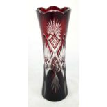 A Trouvailles and Envies Red Crystal Vase. Minor surface damage at mouth of vase. 31cm tall.