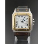 A gents Cartier Sandos 18K yellow gold and steel watch. 29 mm case.