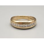 An 18K Yellow Gold Diamond Half-Eternity Ring. Size R. 5.15g