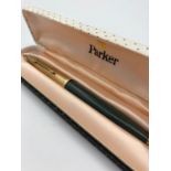 Vintage Parker Fountain pen with 14 carat gold nib and complete with original case.Grey with gold