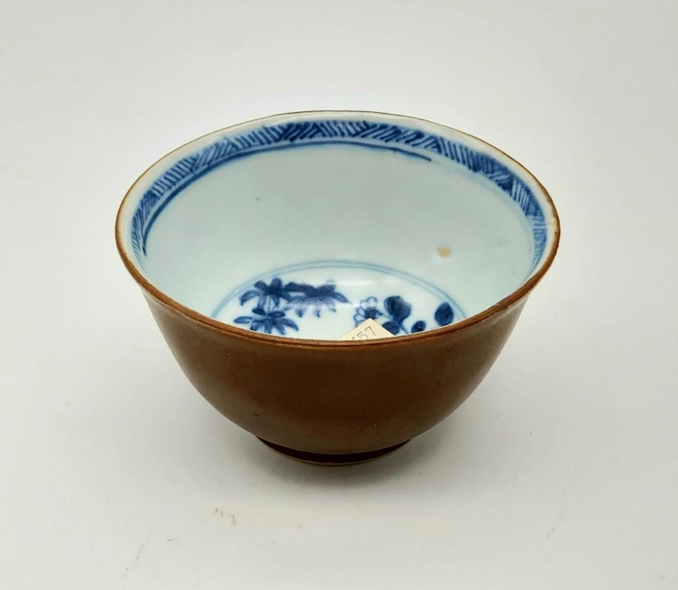 A Nanking Cargo Teacup and Saucer. Hand-Painted with the Batavian Bamboo and Chrysanthemum - Image 7 of 7