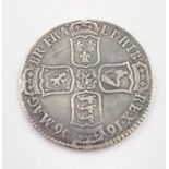 A William III 1696 Silver Half Crown Coin. 15g Condition as per photos.