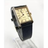 A Vintage Corteal Ladies Tank-Style Dress watch. Leather strap. Gold dial. In full working order.