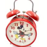 A 1990s Mickey Mouse Red Alarm Clock. Made by Apollo. Good condition - In working order. 10cm