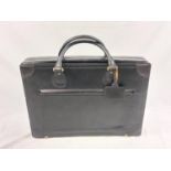 A Vintage Valigeria Black Leather Travelling Case. A few exterior scuff marks but overall in good