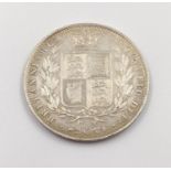 An 1846 Queen Victoria (young head) Silver Half Crown Coin. 14.16g. Condition as per photos.