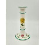 An Antique Victorian Minton Candlestick. Small chip at top. Floral decoration. 20cm tall.