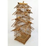 A Vintage Bamboo Pagoda-Style Birdcage. Good condition. 80cm tall.