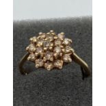 Ladies 9 carat gold DIAMOND cluster ring.Fully hallmarked. 3.0 grams. Size S.