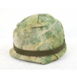 Vietnam War Era US M1 Helmet with reversible Mitchel-Duck hunter Cam Cover.