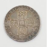 A 1709 Queen Anne Silver Half Crown Coin. 15g Condition as per photos.