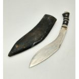 A Small Vintage Kukri Knife. India mark on blade. Ornate lions head handle. 22cm blade.