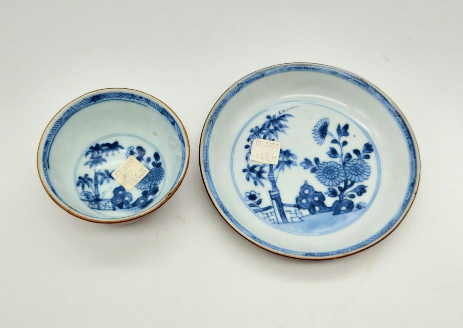 A Nanking Cargo Teacup and Saucer. Hand-Painted with the Batavian Bamboo and Chrysanthemum