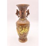 A Chinese Antique Copper Vase. Gilded ornate decoration of children playing below a Buddha-Like