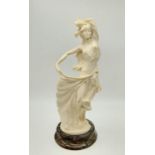 An Italian-Made Alabaster Dancing Woman Figurine. Comes on marble base. Good condition. 41cm tall
