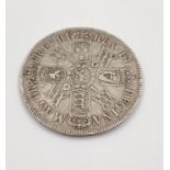 A 1693 William and Mary Silver Half Crown Coin. 14.8g Condition as per photos.