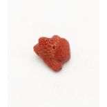 Rough red coral stone