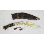 A LARGE VINTAGE GHURKA KUKRI USED IN JUNGLE WARFARE IN ORIGINAL SCABBARD. 44cms