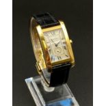 AN 18K GOLD CARTIER TANK STYLE WATCH WITH ORIGINAL STRAP,ROMAN NUMERALS ,ANS SEPERATE SECOND DIAL.