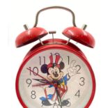 A Mickey Mouse 1970s Alarm Clock. Good condition in working order. 10cm diameter.