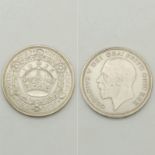 A 1933 George V Silver Crown. 28.32g Condition as per photos.