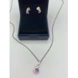 SILVER and AMETHYST pendant mounted on fine silver chain together with matching pair of silver and