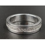 An 18K White Gold Diamond Eternity Ring. Size O. 7.27g