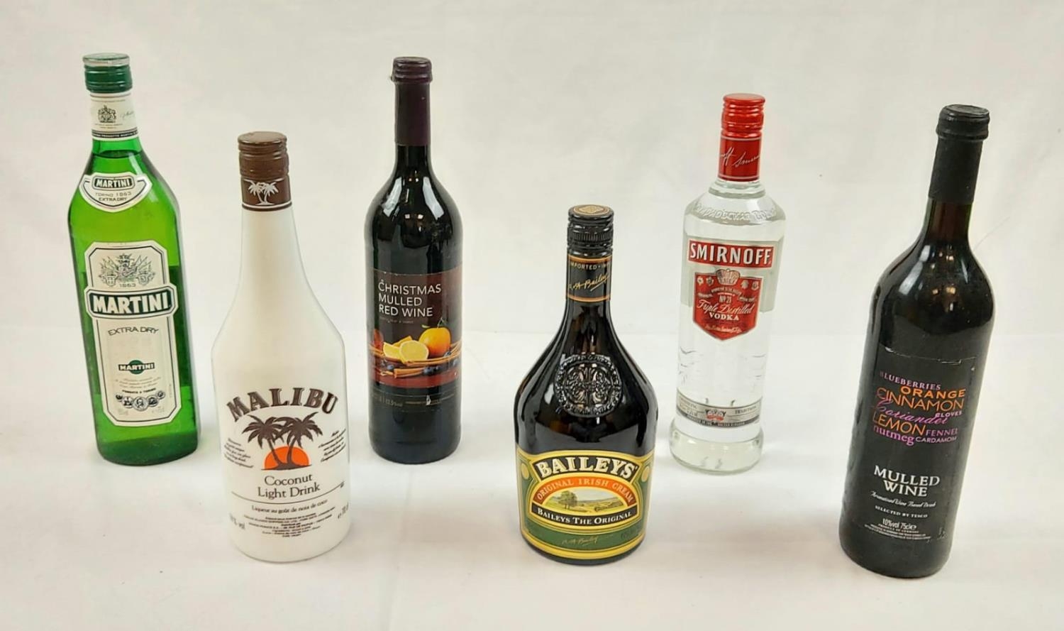 Six Full Bottles of Alcoholic Beverage, Including: Baileys, Smirnoff, Malibu, Martini and two
