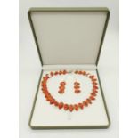 An unusual, sterling silver (fully hallmarked) British designer, red sponge coral necklace and