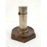 An Antique Oil Lighter with Wood Stand. As found. 14cm tall.