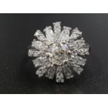 AN ART DECO 18K WHITE GOLD CLUSTER RING WITH APPROX 3ct OF QUALITY DIAMONDS. 5.6gms size K/L