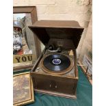 1920/30'S WIND UP GRAMOPHONE MADE BY H.M.V. IN WORKING ORDER NICELY PRESENTED IN WOODEN CABINET.