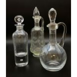 3 GLASS DECANTERS SMALLEST ONE IS 25CM IN HEIGHT WITH THE TALLEST BEING 29CM IN HEIGHT