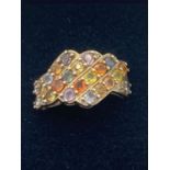 Vintage Silver multi gemstone ring having selection of various topaz etc. Size N/O.