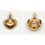 An 18K Yellow Gold Bulgari Heart Pendant. 7.3g