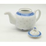 A GOOD EXAMPLE OF A LATE 19TH CENTURY JAPANESE BLUE AND WHITE TEAPOT. 20 X 12cms